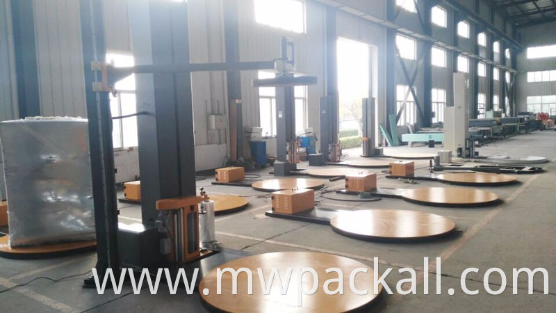 Top pressure plate pressed wooden pallet stretch film wrapping machine